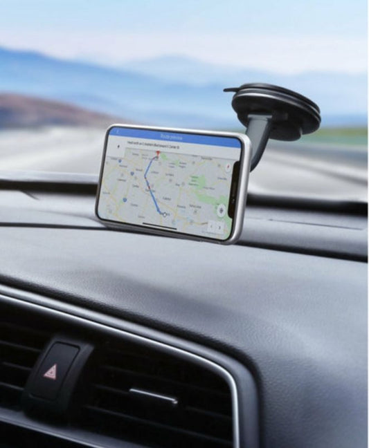 Magnetic phone mount holding a phone in a car