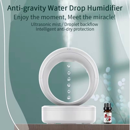 Gravity humidifier misting on a desk at night